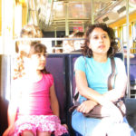 Women making strides on public transport. By ¡Carlitos.