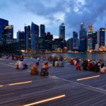 A crowd gathers overlooking Singapore's Marina Bay. Photo by Nicolas Lannuzel/Flickr.